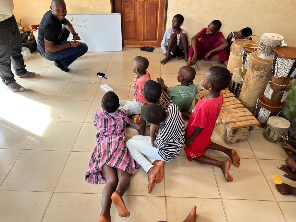 Children-laying-in-drum-circle-afternoon