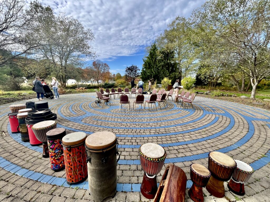 This image illustrates the inclusive and community driven environments that drum circles invite.