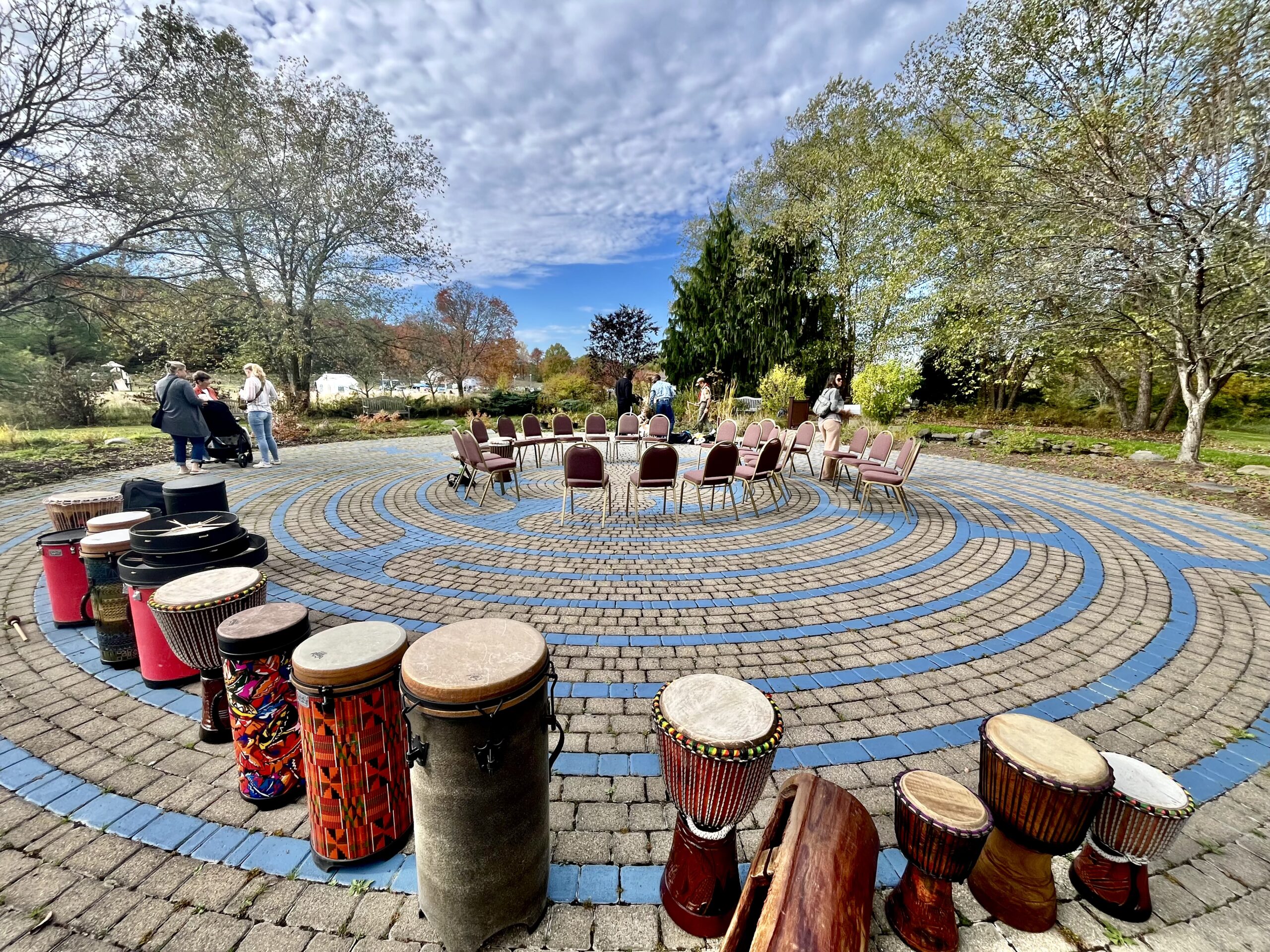 This image illustrates the inclusive and community driven environments that drum circles invite.